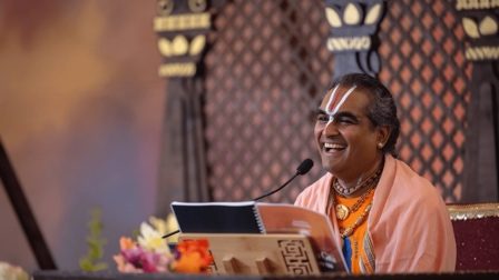 A teacher giving a talk at the ashram